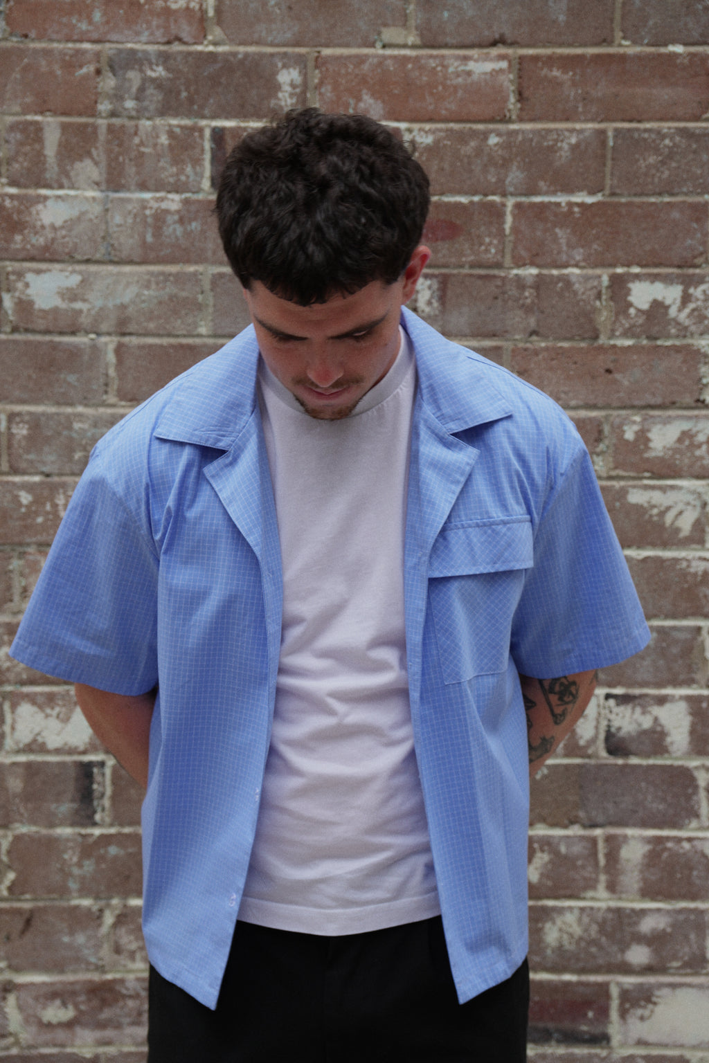 Capsule button up